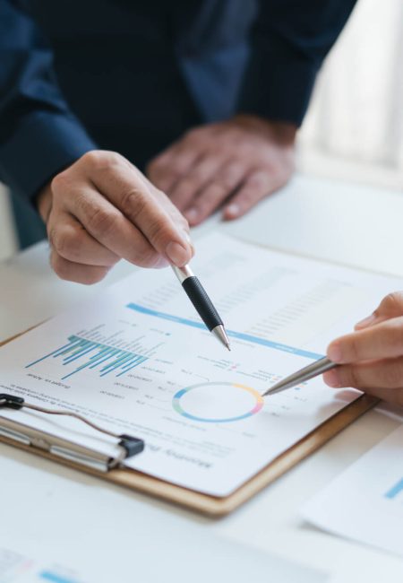 business-sales-consultant-discussing-in-data-documents-at-modern-office-.jpg